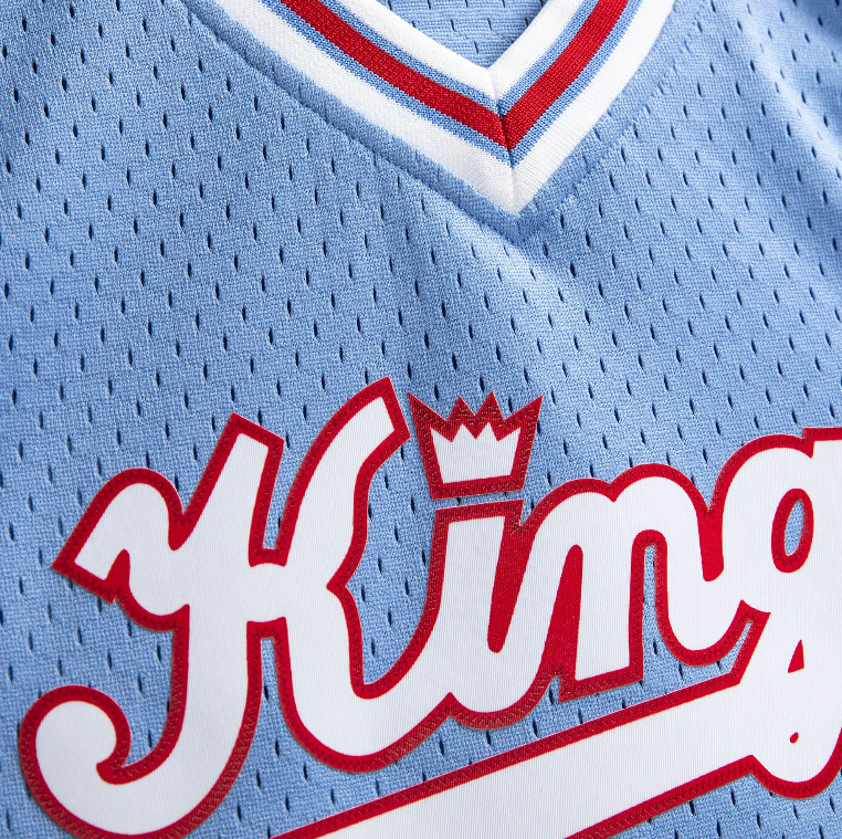 Men’s Reggie Theus Sacramento Kings 1985-86 Powder Blue Swingman Replica Jersey By Mitchell & Ness